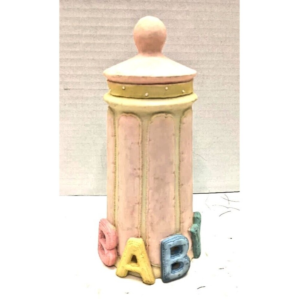 Ceramic Pink with the word BABY on it Coin Savings Bank Lighthouse